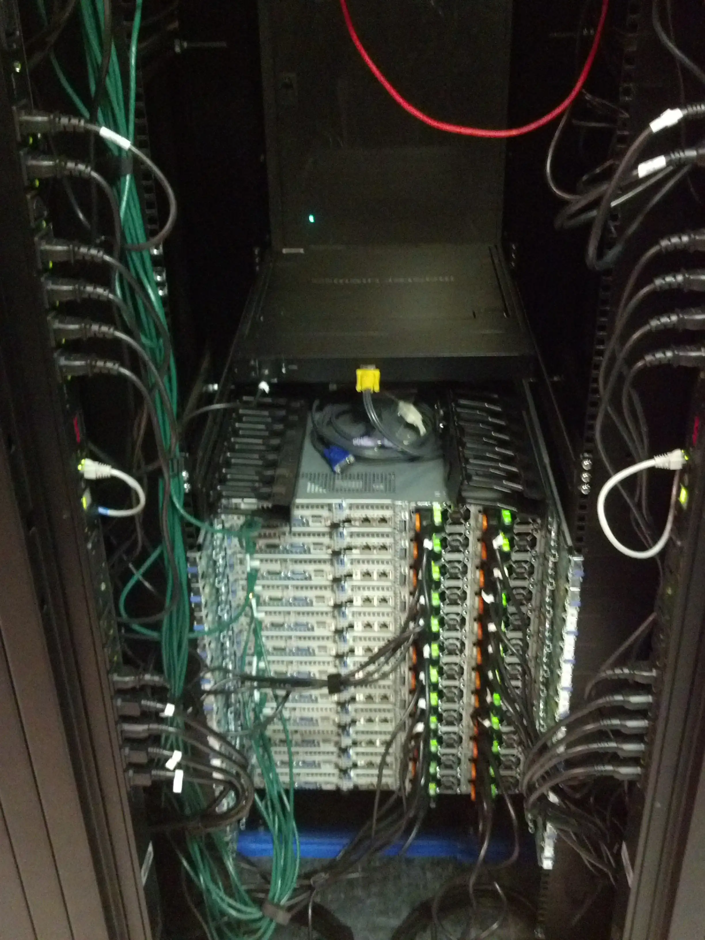 Rows of network servers and cabling in a data floor